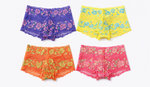 Four pairs of mens lace shorts arranged in a 2x2 grid on a white background, featuring purple with pink flowers, yellow with blue flowers, orange with green flowers, and pink with light pink flowers. A 'Made with AI' watermark is visible in the top right corner.