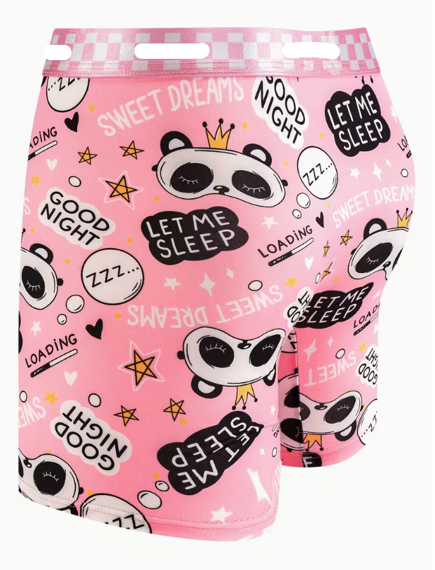 Pink boxer briefs with a playful cartoon panda print, featuring text like 'SWEET DREAMS', 'LET ME SLEEP', and 'GOOD NIGHT' along with stars and speech bubbles. The brand name 'CAOHUAEN' is visible on the waistband.