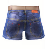 Rear view of men's blue denim shorts with a tan waistband, yellow contrast stitching, and red pocket details on a white background.